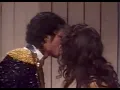 Michael Jackson Irene Cara kiss backstage at the 26th Annual Grammy Awards February 28 1984
