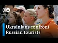 Download Lagu Ukrainian refugees confront Russian tourists in Turkey | DW News