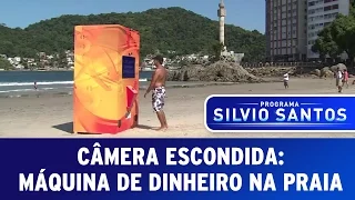 hidden camera money machine on the beach