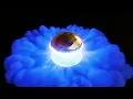 Gold and Blue Geometry Nodes and Smoke Simulation Blender EmberGen