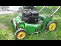 1980s John Deere walk behind mower with electric start