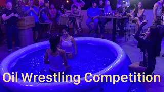 Download Oil Wrestling Competition at 69 Rock Bar MP3