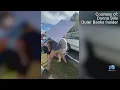 Kitty Hawk woman charged for alleged flag theft