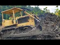 Excellent Work of Caterpillar D6D Bulldozer Operators Working to Level Clay