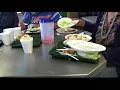 Gainesville and Alachua County Commissioners Serve Food at Grace Marketplace