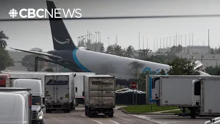 At least 5 dead after Amazon cargo plane barrels off Miami runway