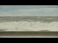 High waves up to 18 feet slam Lake Michigan shoreline
