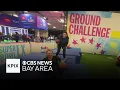 KPIX anchors Sara Donchey Juliette Goodrich compete in the Super Bowl Experience