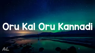 sms oru kal oru kannadi lyrics 