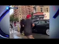 Cops doused with buckets of water on NY street