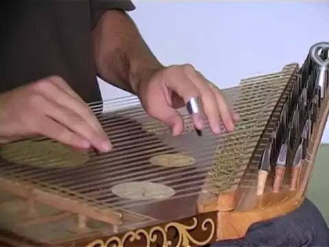 Bassem Alkhouri demonstrates the qanun