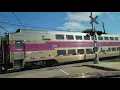 MBTA Commuter Rail engine rolls past Union Street in Franklin MA 2023