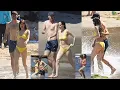 Dakota Johnson Sizzles In Yellow Bikini As She Splashes Around The Beach With BFF Jeremy Allen White