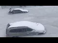 Freezing floodwaters swamped cars in Boston as high tide combines with snowstorm