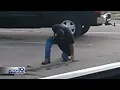 shows Bill Miller BBQ employee pulling weeds with a screwdriver customer concerned