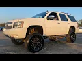 I WENT TO BUY A LIFTED Z71 4x4 DRIVE CHEVY TAHOE ON CUSTOM RIMS AND AFTER MARKET SUSPENSION