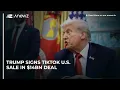 Download Lagu Trump signs TikTok U.S. sale in $14bn deal