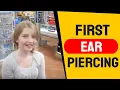 Savanna getting her ears pierced at Walmart