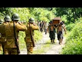 Lagu Japanese troops intercept a funeral procession, unaware the coffin is packed with guns and weapons.