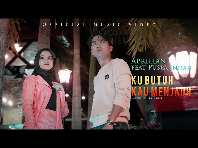 Download MP3 Aprilian Ft. Puspa Indah - Ku Butuh Kau Menjauh (Official Music Video)