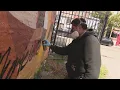 Latinx artist transforms blank building walls into beautiful murals
