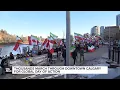 Lagu Thousands march through downtown Calgary for Global Day of Action
