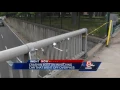 Speeding car crashes off Boston overpass