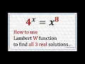 How to use the Lambert W function to find the real solutions