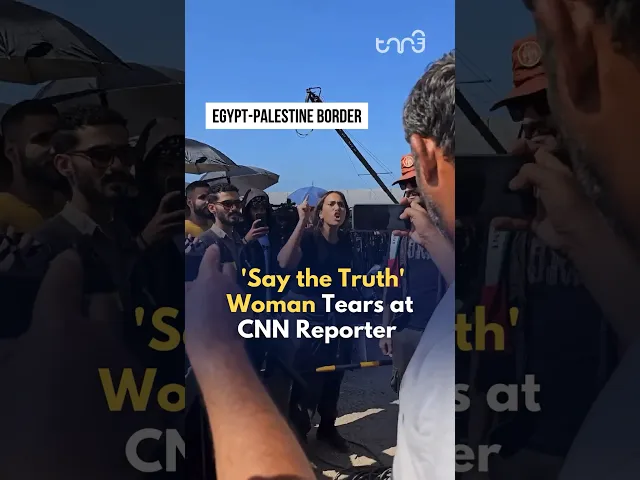 ⁣Egyptian woman confronts CNN reporter.