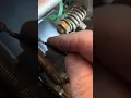 Replacing a lower traction cable of an Ariens Deluxe Snowblower