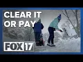 Grand Rapids enforces sidewalk snow rules