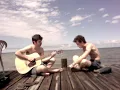 Zack and Dave of The Revivalists Sitting on the Dock of the Bay