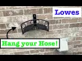 How to install Lowes garden hose wall mount