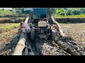 Download Lagu Agricultural vehicles transporting timber are extremely difficult when dealing with two giant trees.