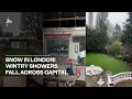 Lagu Snow falls across London as UK gripped by cold snap