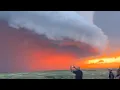 Download Lagu Surreal scene: Giant clouds roll under fiery sky in Dakota, USA