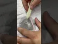 The process of removing stains at a dry cleaners