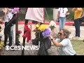 Texas residents reel from deadly mass shooting at outlet mall