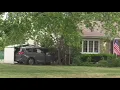 Minivan slams into Des Plaines home