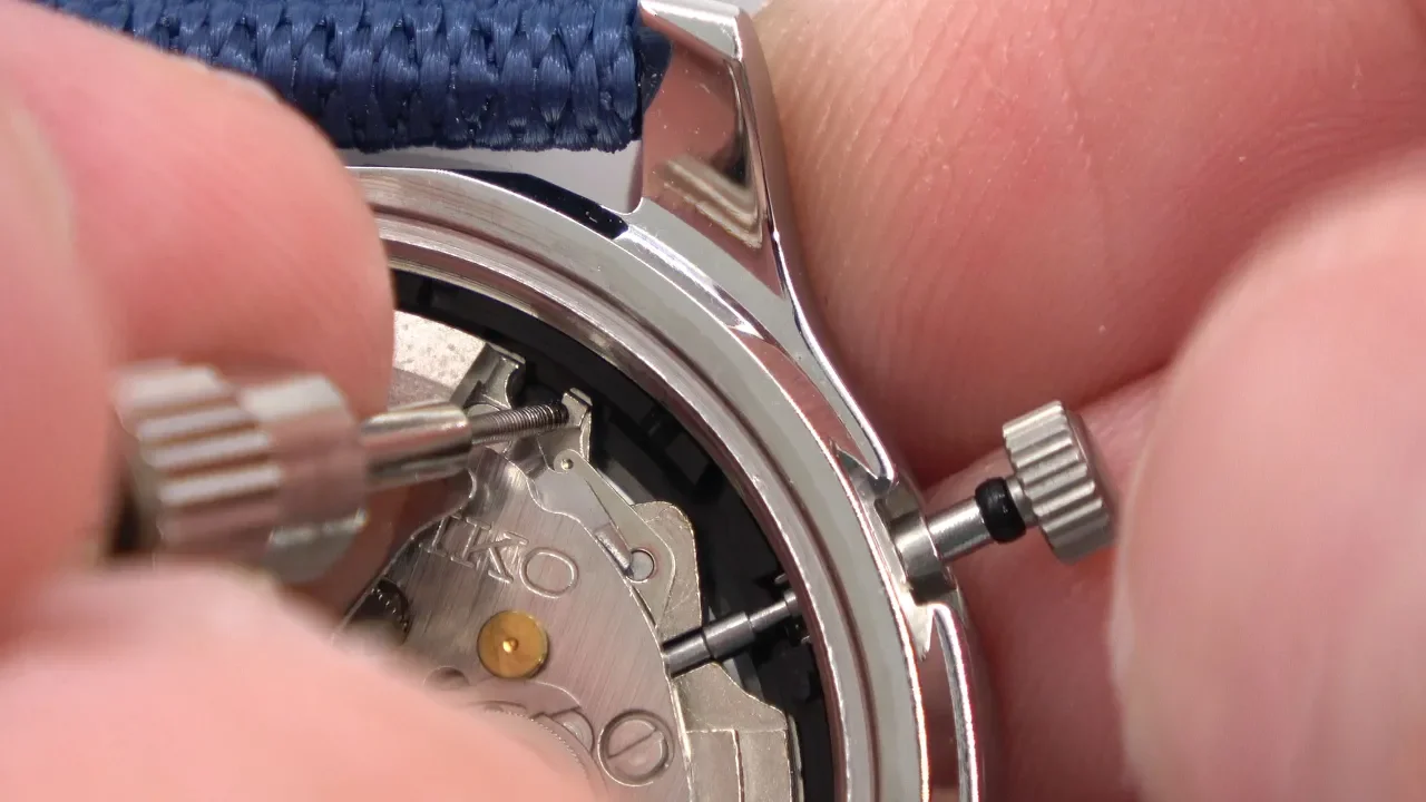 Servicing a Movado watch. 