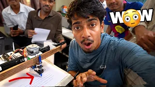 He made a "HANDWRITING ROBOT" - আচৰিত বস্তু বনালে 