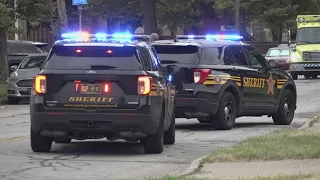 Cuyahoga Metropolitan Housing Authority police officers suspect exchange gunfire injuring 2