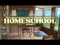 We transformed our spare cedar room into a cozy vintage-inspired homeschool classroom