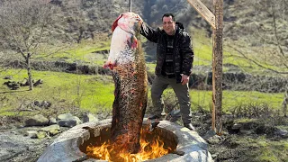 i caught a huge fish and cooked it in a big tandoor fish day in the village