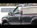 man playing Christmas song in line at Fred Meyer gas station 12 20 16