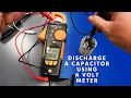 Can You Discharge a Capacitor Using a Voltmeter