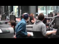 Guy Uses Typewriter in College Library