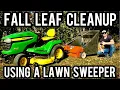 Fall leaf cleanup using a lawn sweeper