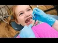 BRAVE DENTiST VISIT Adley has a tooth check up at our clinic and gets her vampire teeth cleaned