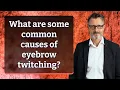 What are some common causes of eyebrow twitching